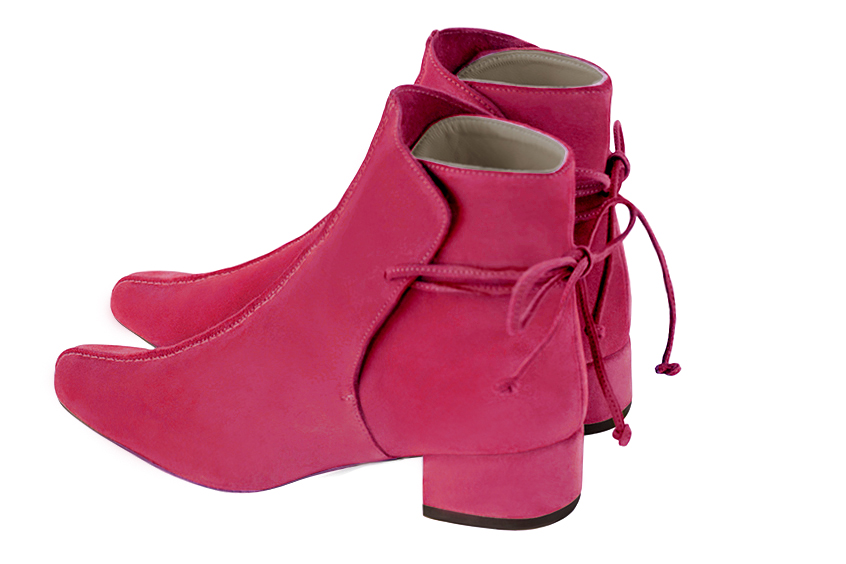 Fuschia pink women's ankle boots with laces at the back. Round toe. Low block heels. Rear view - Florence KOOIJMAN